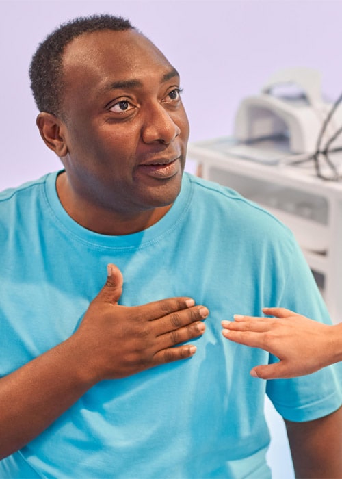 Patient pointing at his heart